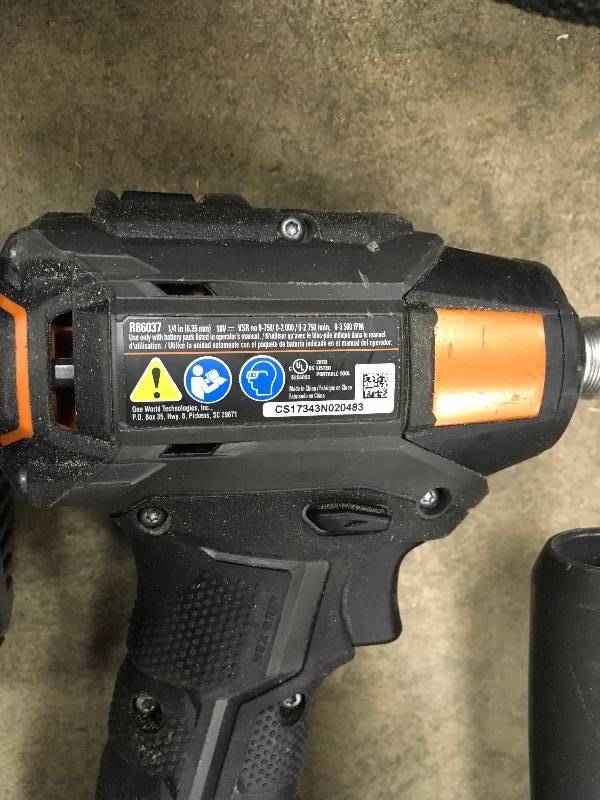 lot 31 image: Ridgid 18-Volt 7-14 in. Cordless Brushless Circular Saw drill and grinder Combo Kit  Used in good working condition