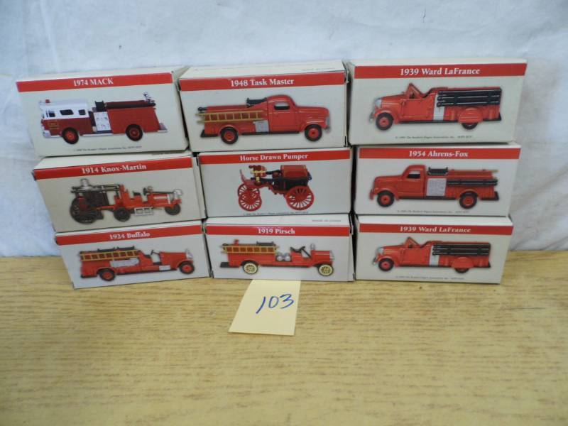 lot 103 image: Colletible Fire Trucks