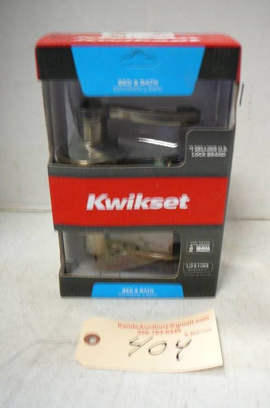 lot 404 image: KwikSet Bed & Bath Door Handle