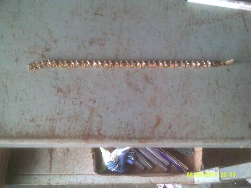 GOLD AND DIAMOND TENNIS BRACELET