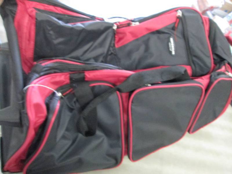 Adventure Travelers Club Roller Bag...
