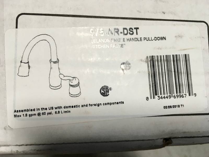 Delta Leland Single-Handle Pull-Down Sprayer Kitchen Faucet in Arctic Stainless Featuring MagnaTite Docking in good conditions