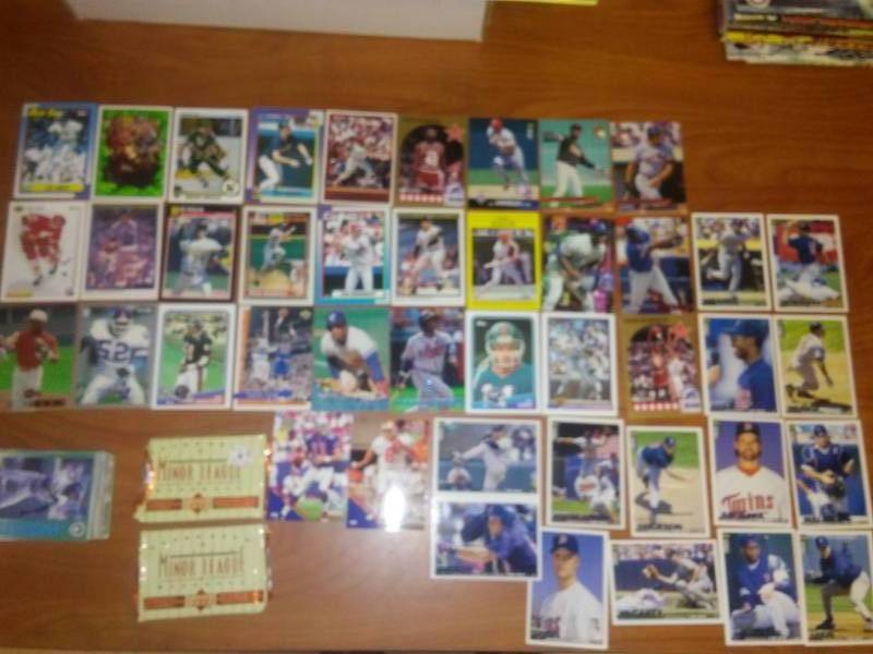 All sports cards. Knoblauk, Ewing, Young, Bledsoe, Twins cards, Singletary, Alomar, Tapani