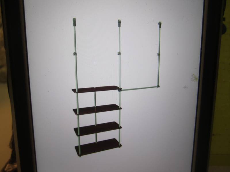 lot 34 image: Closet Maid 4 ft x 8 ft Laminate Cl...