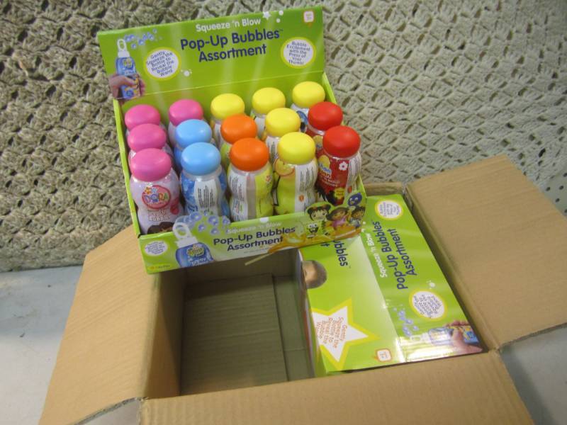lot 107 image: Case of 30 Squeeze N Blow Pop-Up B...