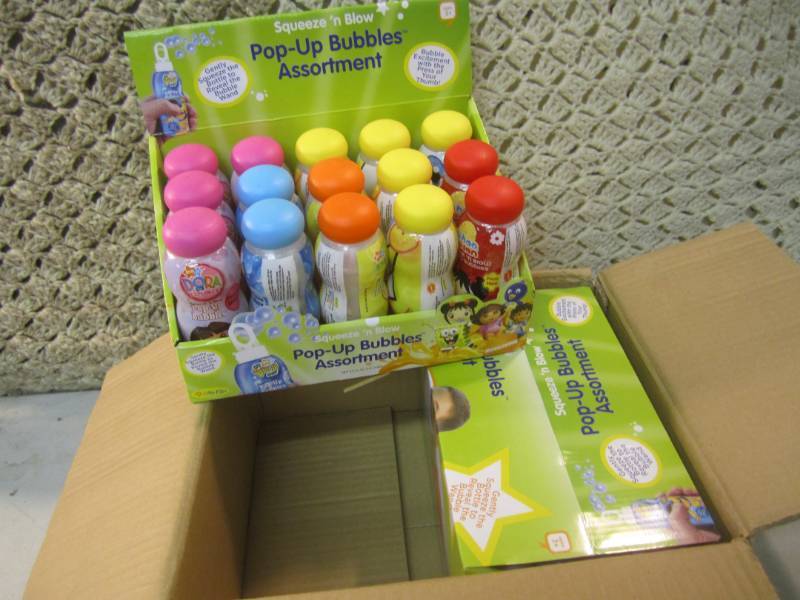 lot 109 image: Case of 30 Squeeze N Blow Pop-Up B...