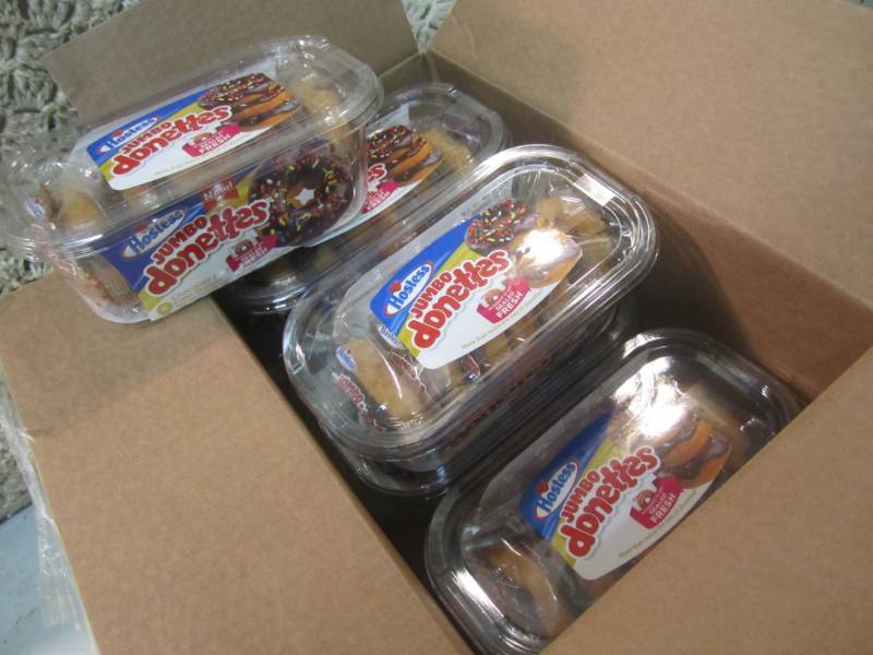 lot 226 image: Case of Jumbo Chocolate Iced Cake D...