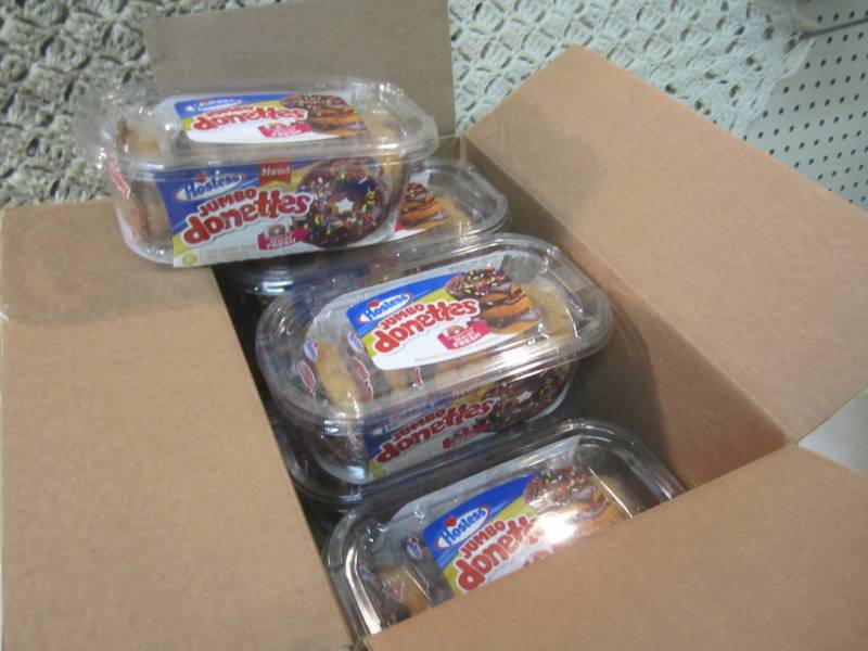 lot 227 image: Case of Jumbo Chocolate Iced Cake D...