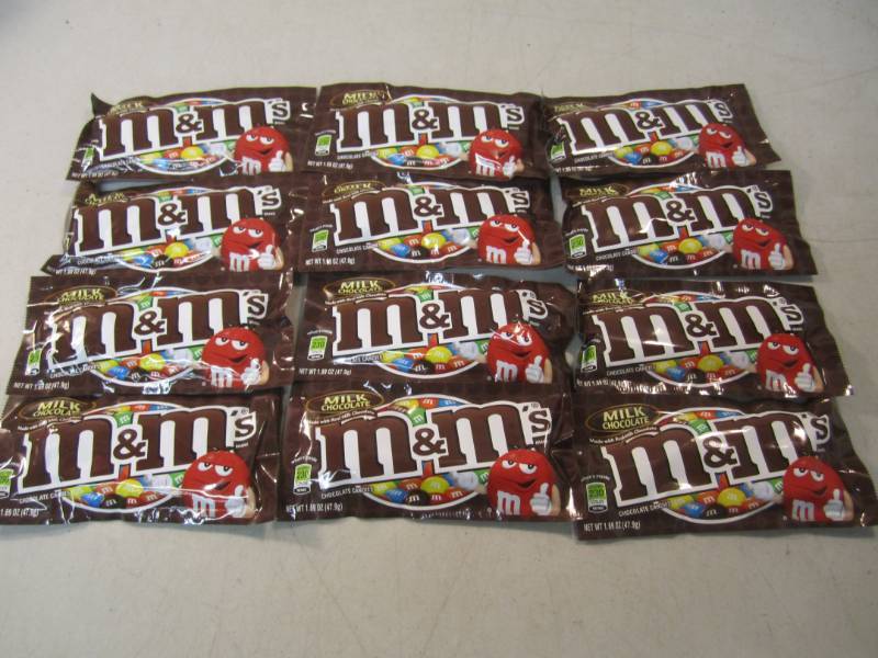 lot 238 image: 12 Bags of M&Ms Best by Nov 2018  ...
