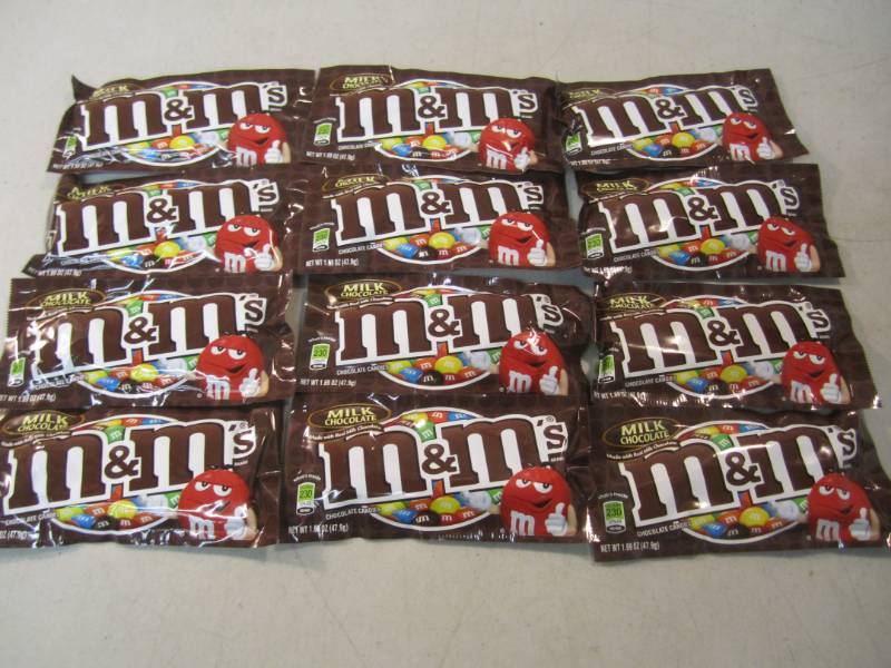 lot 239 image: 12 Bags of M&Ms Best by Nov 2018  ...