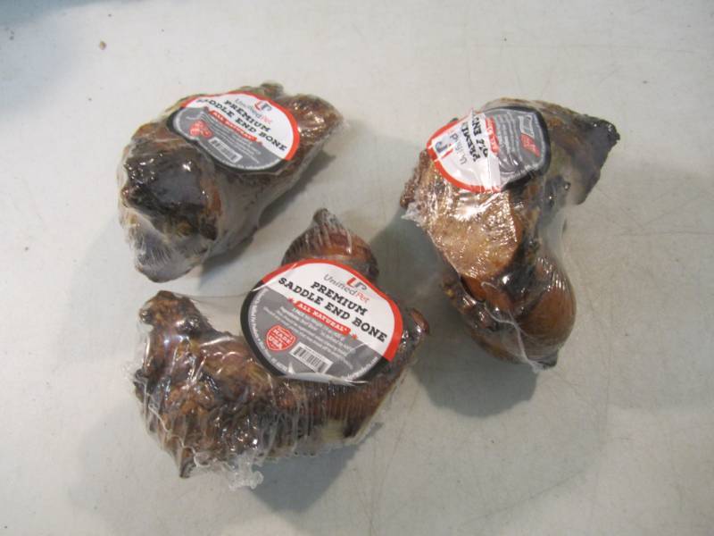 lot 243 image: 3 Premium Saddle End Bone Dog Chews...