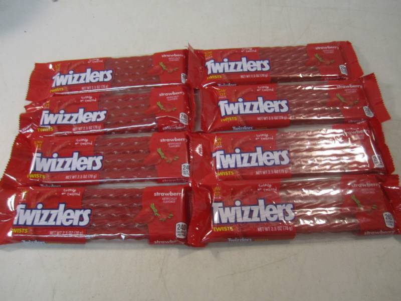 lot 256 image: 8 Twizzlers Twists Best by May 2018...