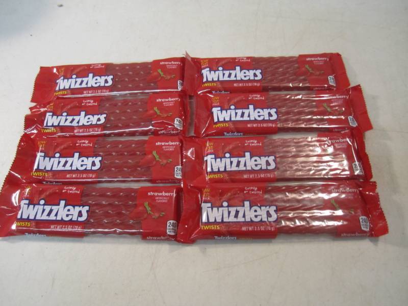 lot 257 image: 8 Twizzlers Twists Best by May 2018...