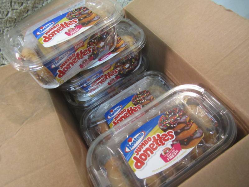 lot 270 image: Case of Jumbo Chocolate Iced Cake D...