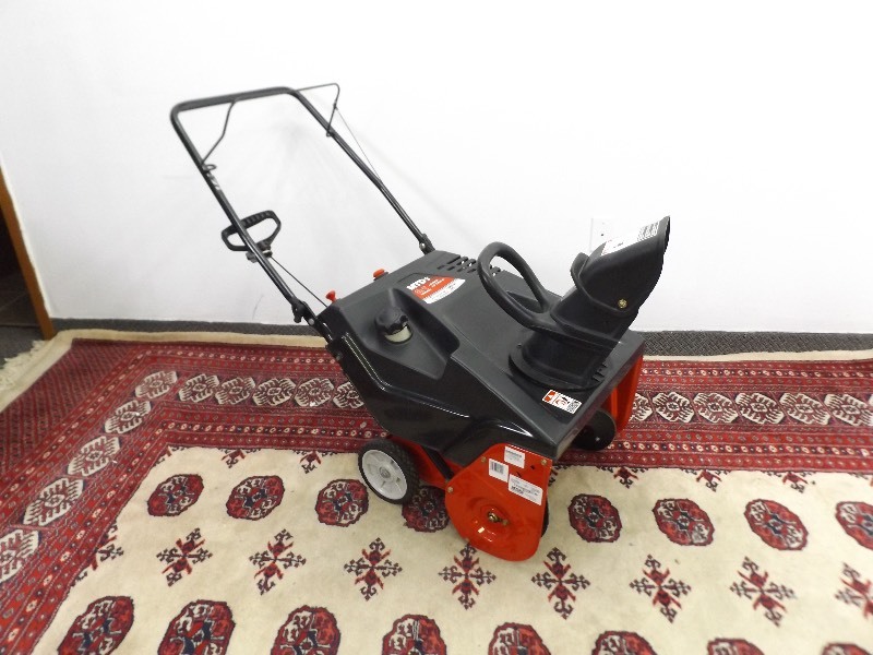 lot 14 image: LIKE NEW MTD 21 123cc 4 Cycle Easy Shoot Snowblower