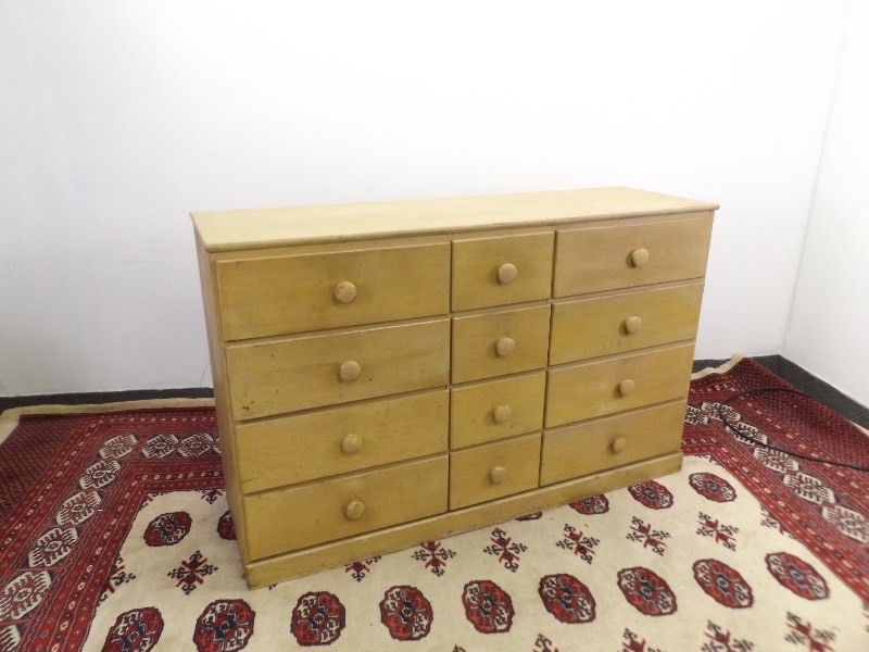 lot 15 image: 12 Drawer Wood Lowboy Chest of Drawers