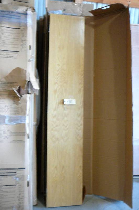 lot 555 image: Bifold Lynden Door Red Oak