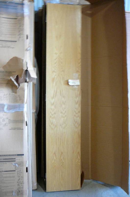 lot 556 image: Bifold Lynden Door Red Oak
