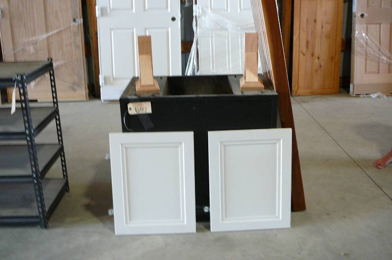 lot 607 image: Laminated Thomas Creek 52 L x 17 , Wooden Display 33L x 20 12, White Doors 22 34, Maple Shelf Brackets(2)