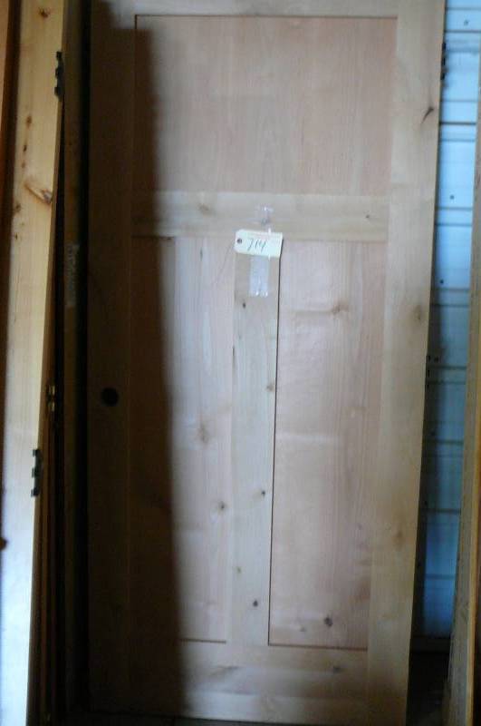 lot 714 image: Wood Door 3 panel  36 x 80
