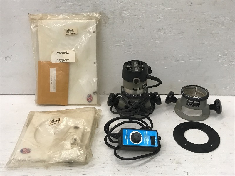 lot 34 image: Porter Cable Router, Saw Base, Etc