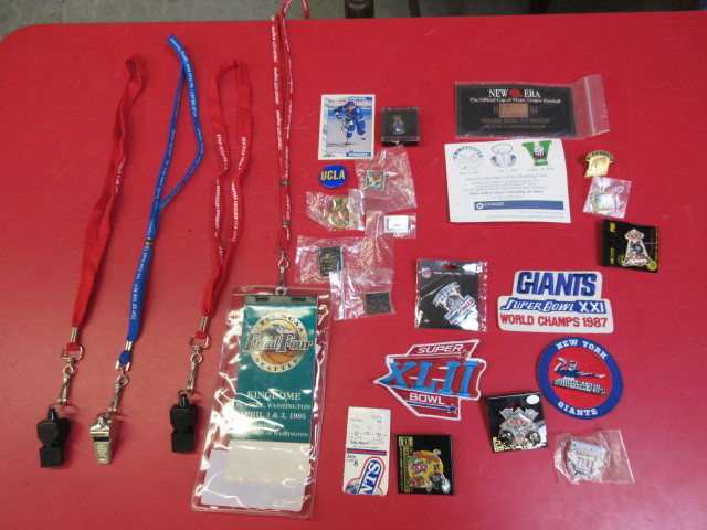 lot 115 image: SPORTS PINS, GAME WHISTLES & MORE