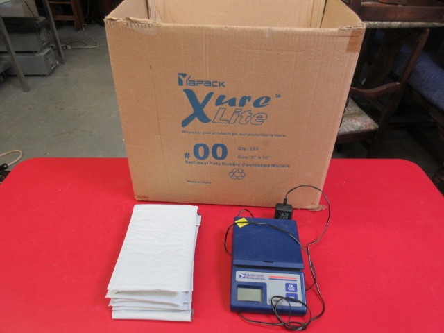 lot 123 image: POSTAGE SCALE AND CUSHIONED MAILERS
