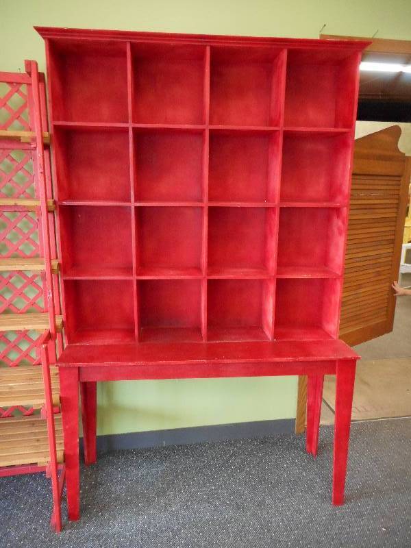 lot 16 image: Red Table With Cubby Hole Shelves