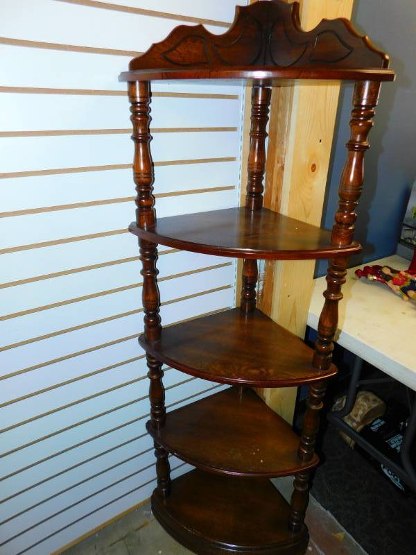 lot 16 image: Five Shelf Dark Brown Finish Corner Cabinet