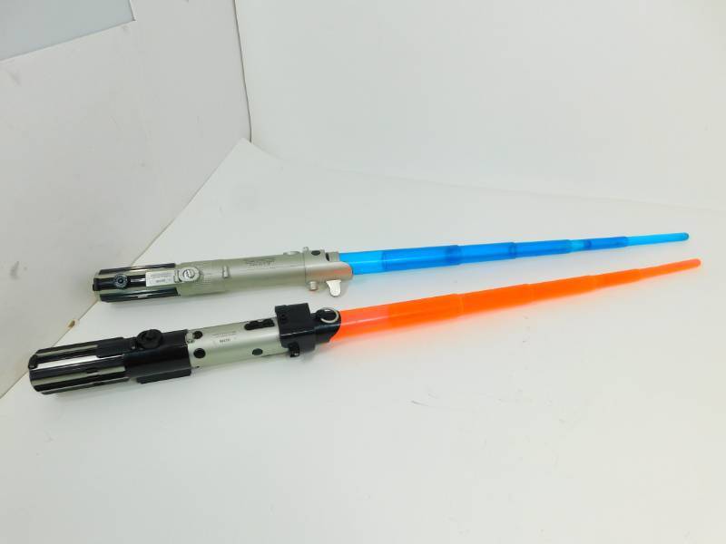 lot 60 image: Two Retractable Lightsabers--14 Long When Closed Up
