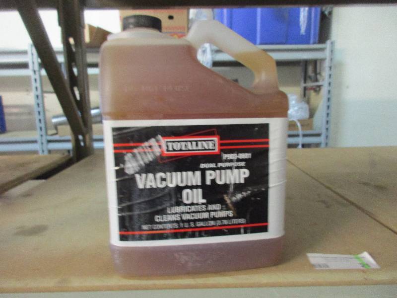 lot 21 image: Vacuum pump oil