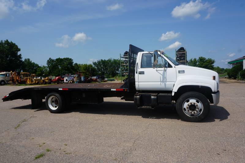 lot 5 image: 1998 GMC 5500 Flat Bed Truck With Roll Off Dovetail