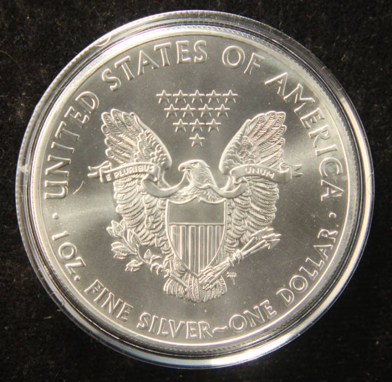 lot 11 image: 2012 AMERICAN SILVER EAGLE 1 TROY OZ. .999 FINE SILVER IN AIRTITE