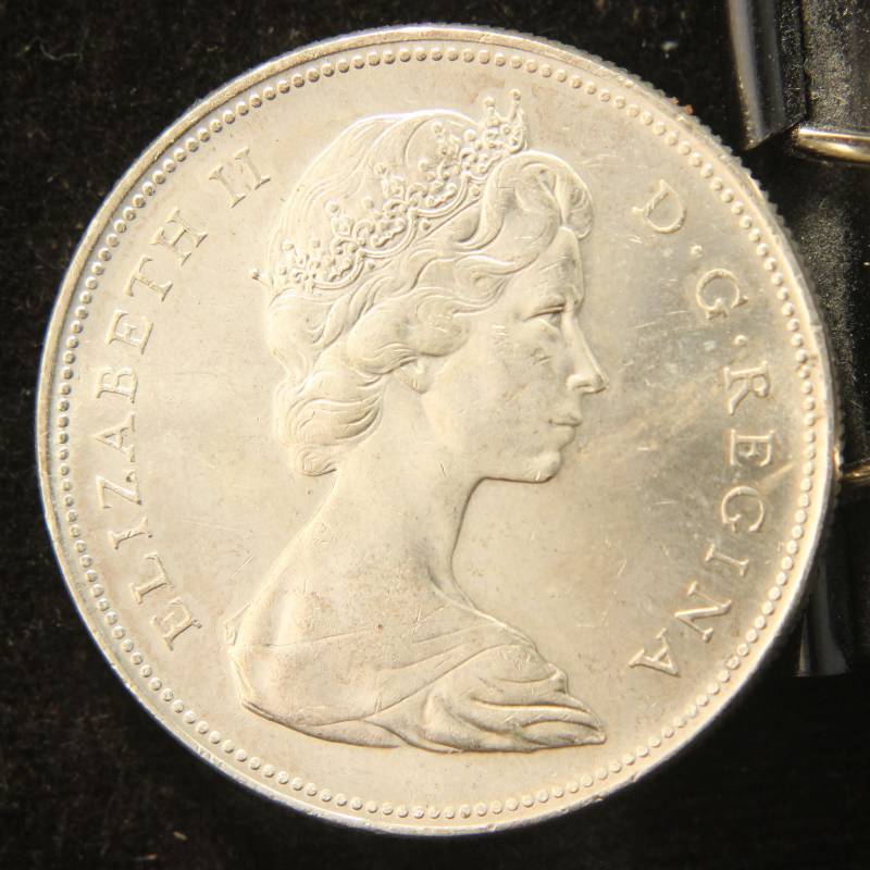 lot 20 image: 1966 CANADA SILVER DOLLAR CANOE REVERSE BU-UNC