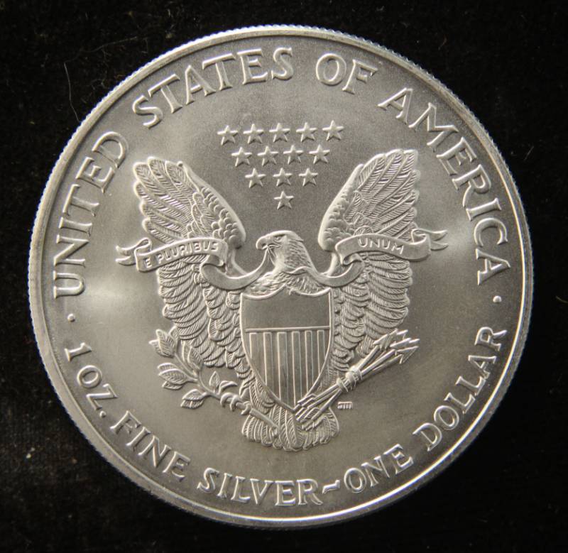 lot 26 image: 2002 AMERICAN SILVER EAGLE 1 TROY OZ. .999 FINE SILVER DOLLAR