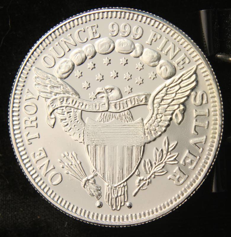 lot 34 image: 1 TROY OZ. .999 FINE SILVER DEPT OF THE ARMY ROUND