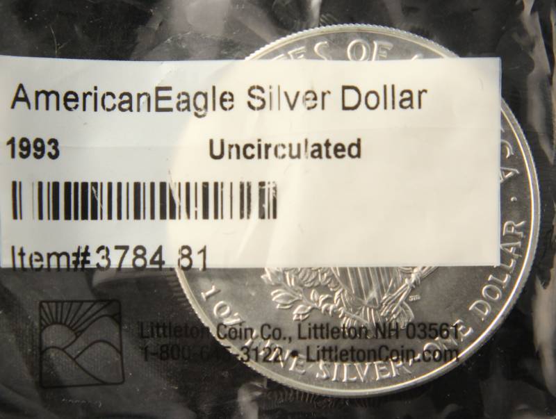 lot 36 image: 1993 AMERICAN SILVER EAGLE 1 TROY OZ. .999 FINE SILVER SEALED LITTLETON