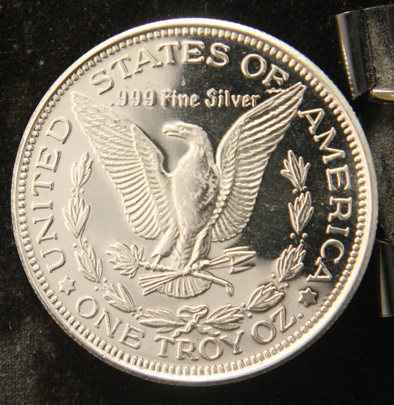 lot 51 image: 1 TROY OZ. .999 FINE SILVER MORGAN DOLLAR DESIGN