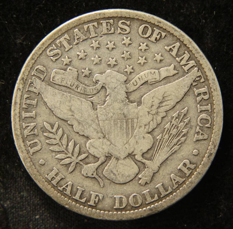 lot 63 image: 1909 BARBER SILVER HALF DOLLAR VG