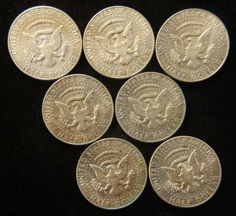 lot 66 image: GROUP OF 7 US 40% SILVER KENNEDY HALF DOLLARS (1965-1969)