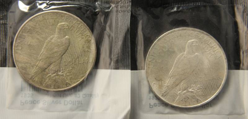 lot 67 image: 2 SILVER DOLLARS 1923 UNC & 1935 AU BOTH SEALED IN ORIGINAL LITTLETON PKG