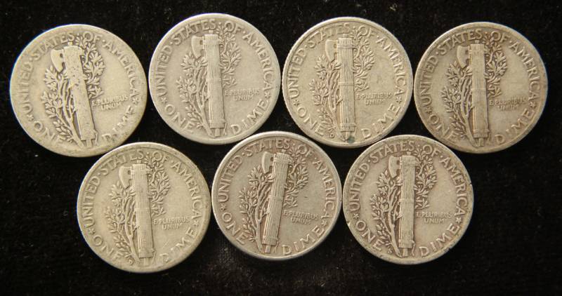 lot 74 image: 7 SILVER MERCURY DIMES AS PICTURED