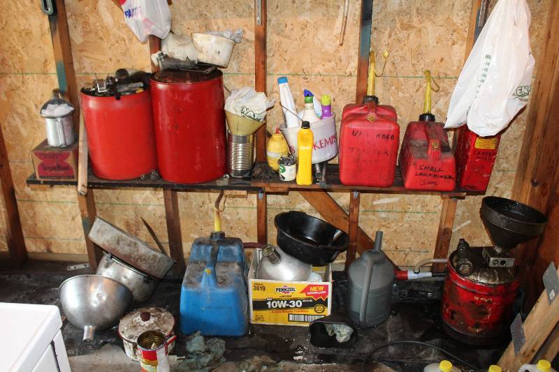 lot 24 image: Gas Cans, Funnels, Motor Oil, Dolly