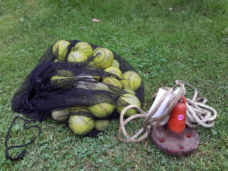 lot 30 image: Softballs and a Boat Anker