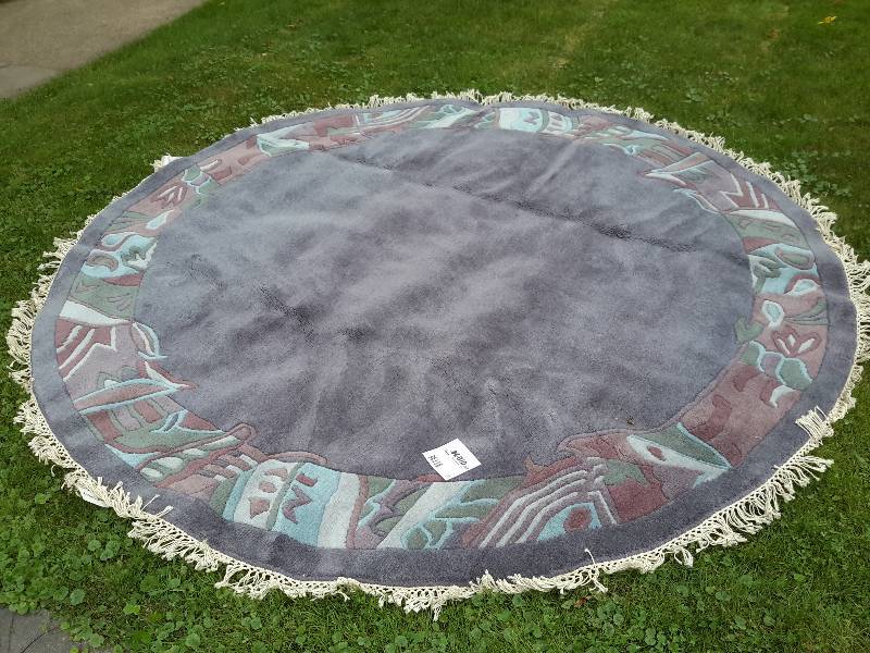 lot 31 image: Large Hand Woven Aera Rug