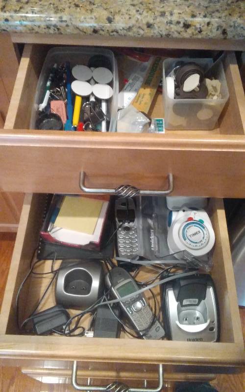 lot 47 image: Contents Of 4-Kitchen Drawers  Cordless Phones, Kitchen Towels, 1-Junk Drawer