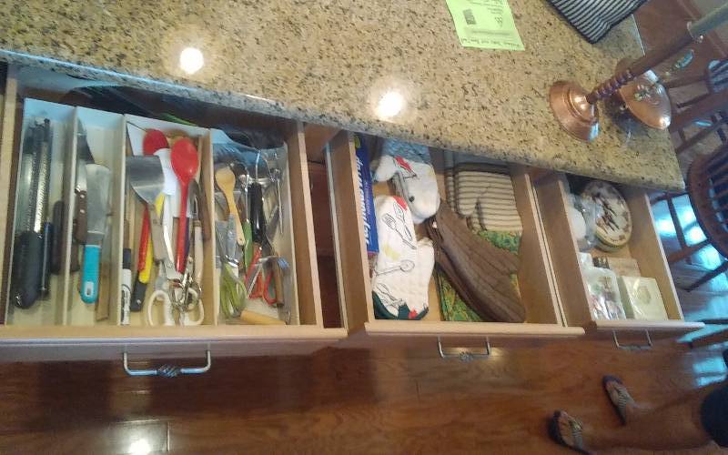 lot 51 image: Contents Of 3-Kitchen Drawers Utensils, Oven Mitts, NEW Party Napkins