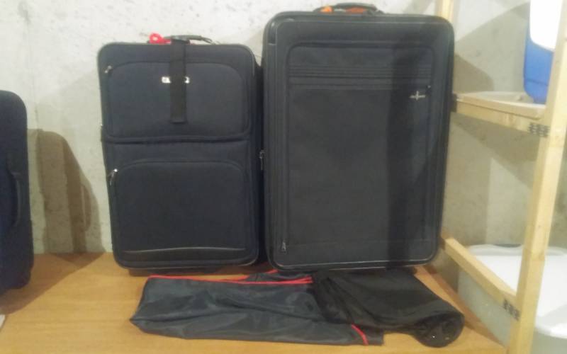 lot 82 image: 2-Large Rolling Suitcases(Protege & Atlantic), 2-Garment Bags