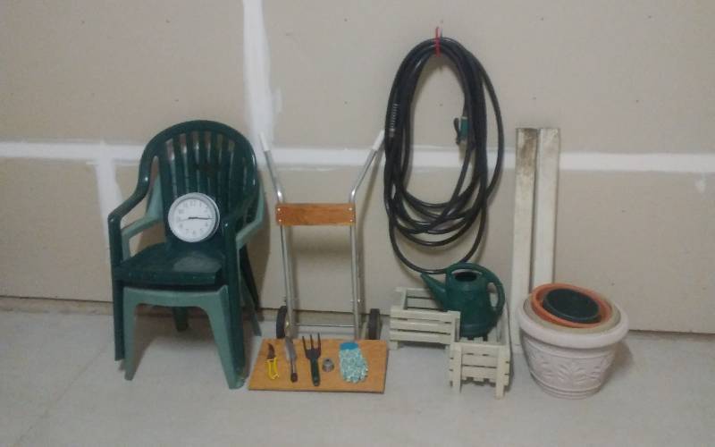 lot 93 image: 2-Patio Chairs, Clock, Cart, Planter Pots, Garden Hose