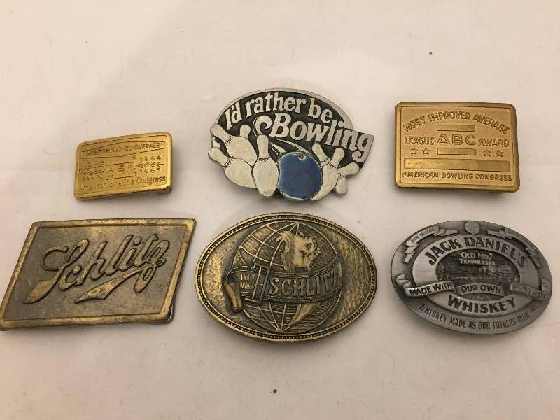 lot 334 image: Belt Buckles - Schlitz Jack Daniels More